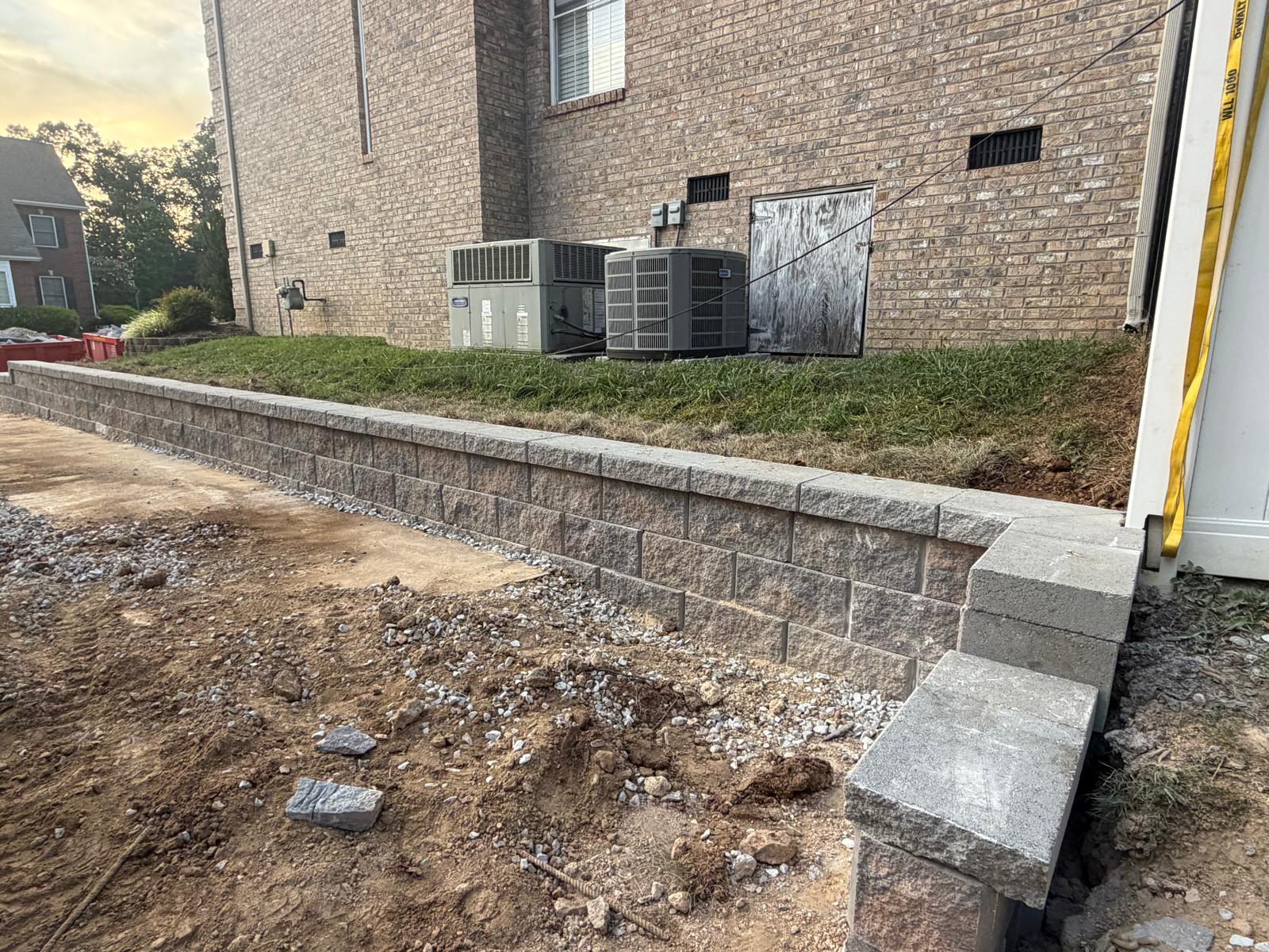 Capped block wall with finished corner return