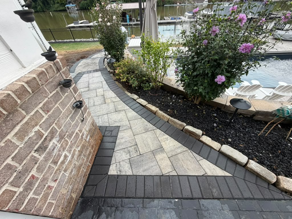 Lakeside paver walkway with stone edging
