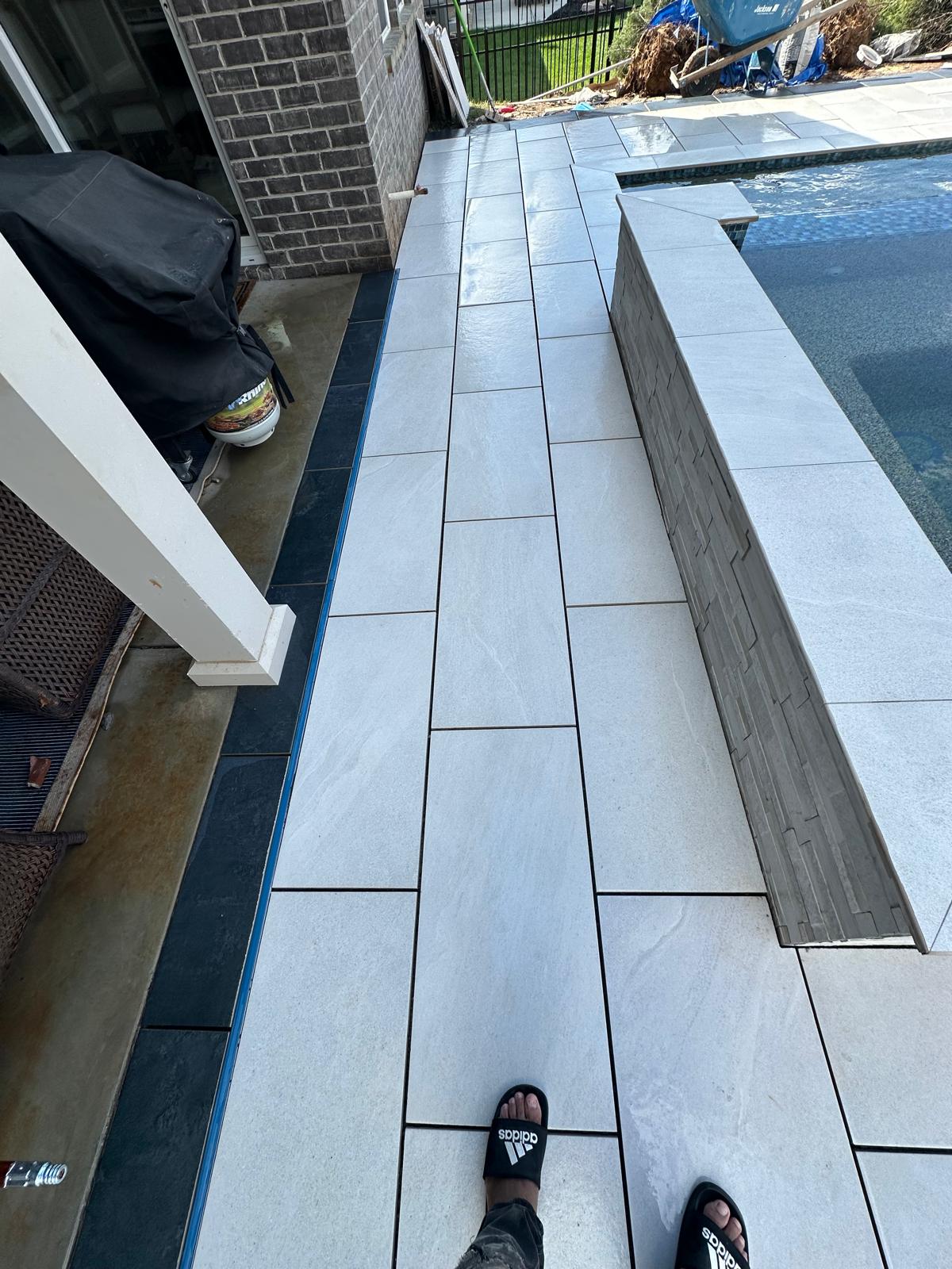 Porcelain plank walkway poolside