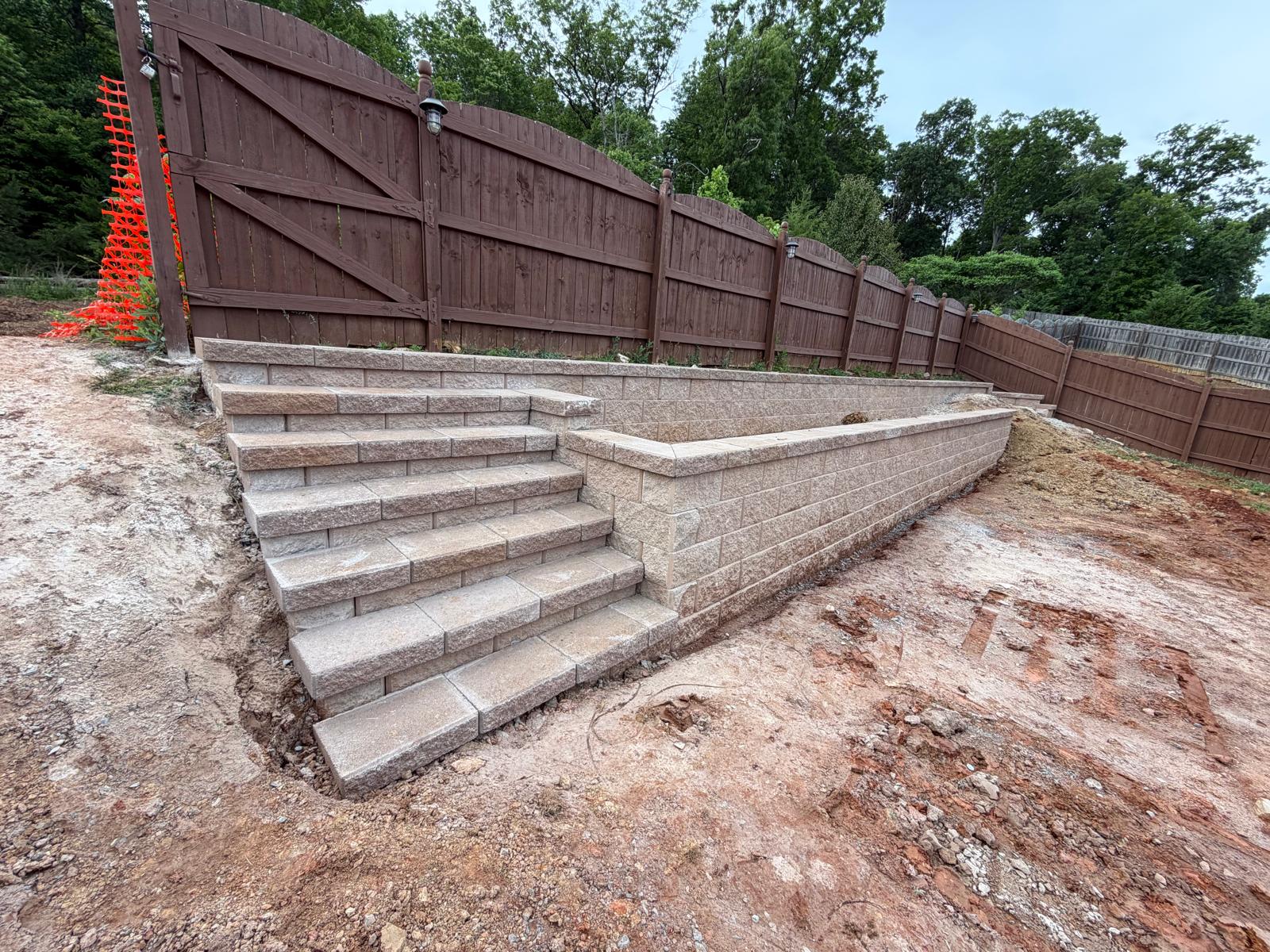 Retaining wall with integrated steps