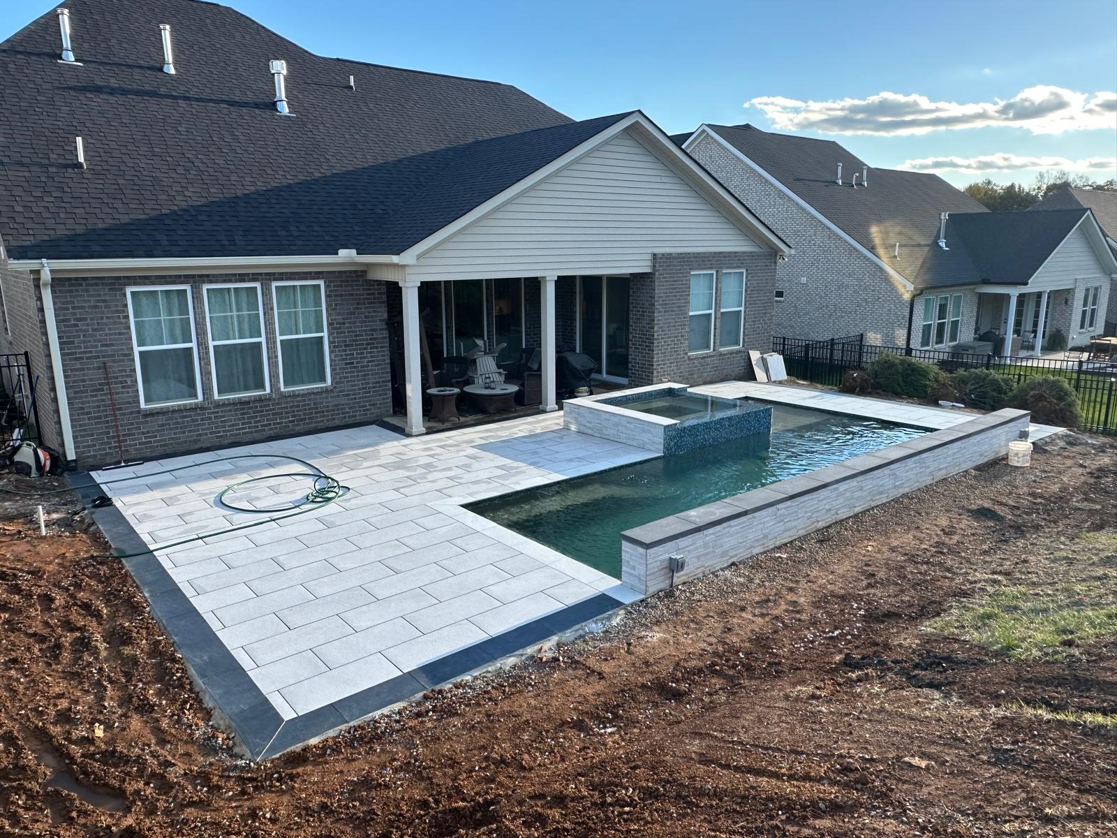 Modern porcelain pool & spa deck